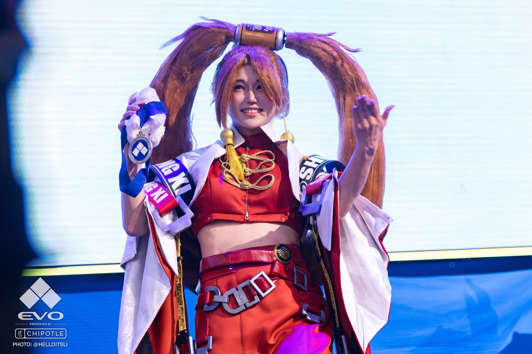 ONESAYA as Jam Kuradoberi holding an Evo 2026 finalist medal